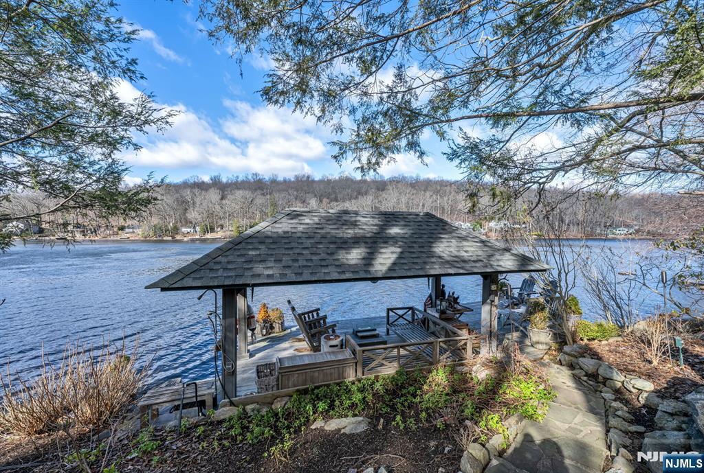 26 Short Road Bloomingdale, NJ 07420 - Photo 42 of 46 a view of backyard with seating space and trees