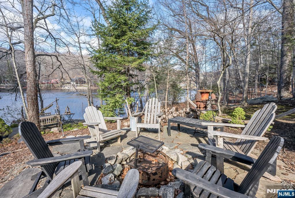 26 Short Road Bloomingdale, NJ 07420 - Photo 44 of 46 a view of a chairs and table in backyard