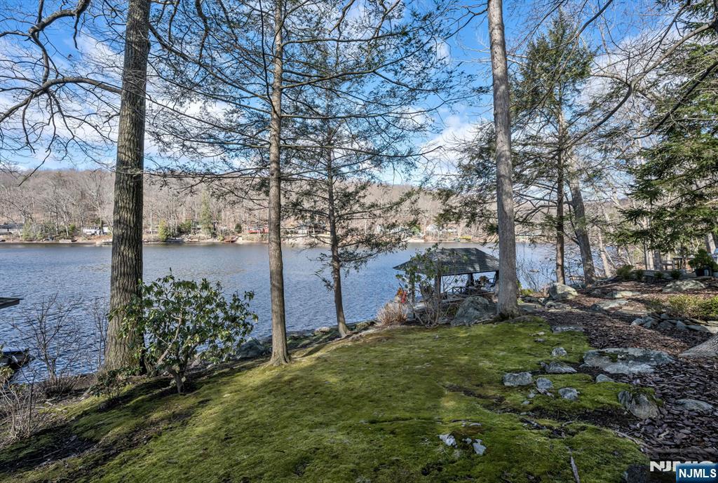 26 Short Road Bloomingdale, NJ 07420 - Photo 45 of 46 a view of a backyard with large trees