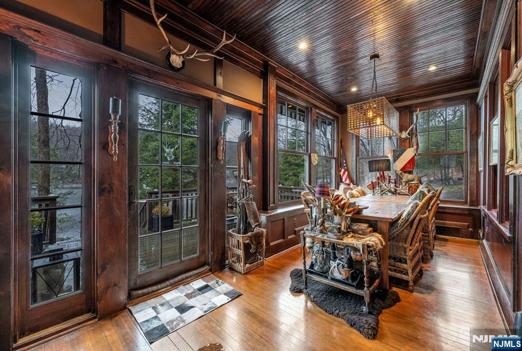 26 Short Road Bloomingdale, NJ 07420 - Photo 6 of 46 a dining room with wooden floor and furniture