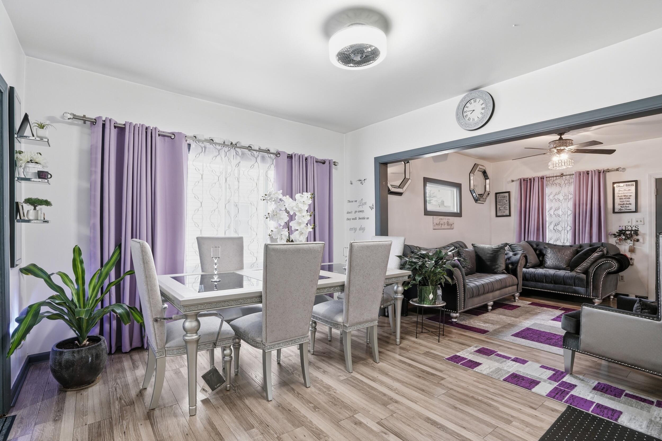 6249 Monroe Avenue Hammond, IN 46324 - Photo 6 of 22 a living room with furniture potted plant and a large window