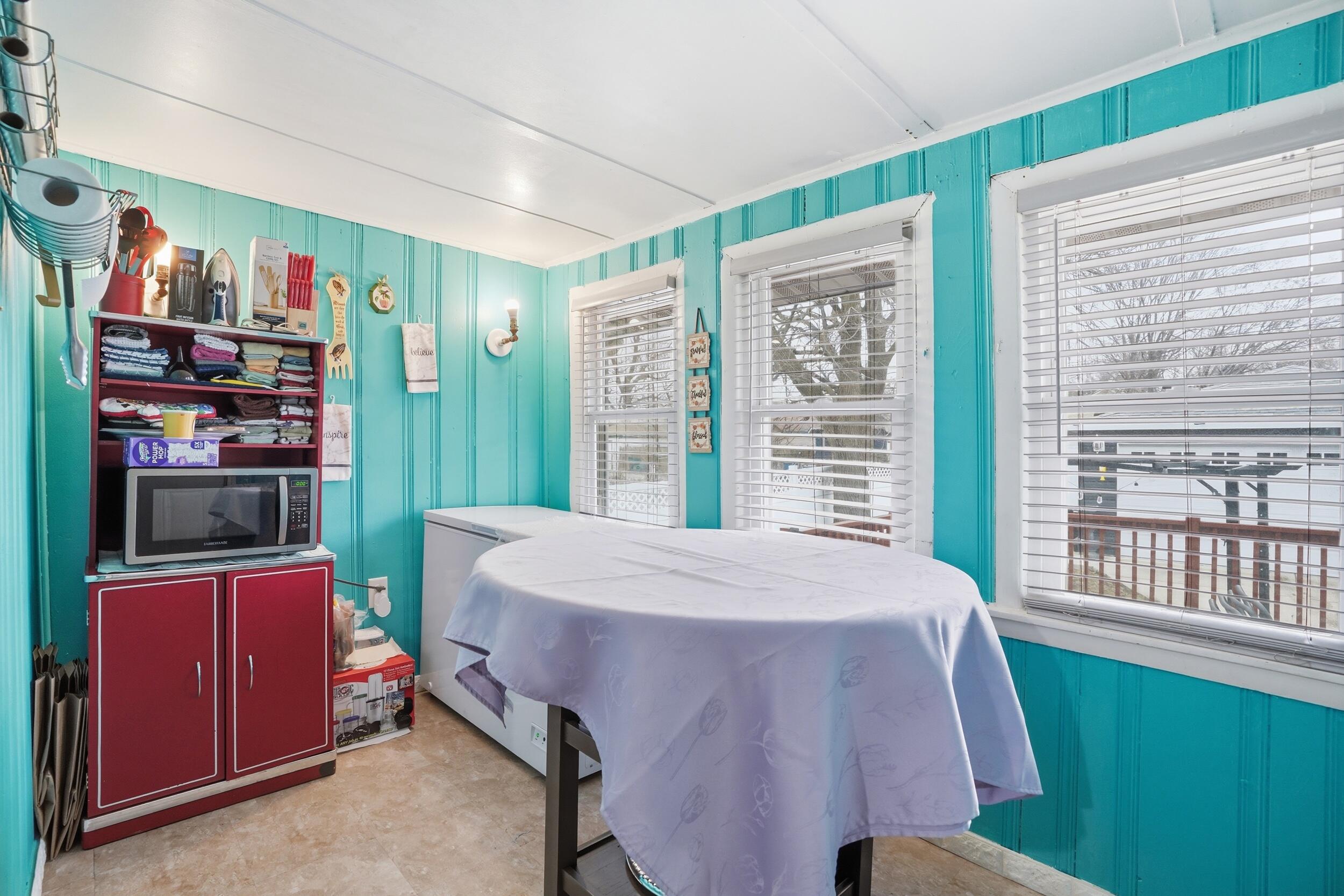 6249 Monroe Avenue Hammond, IN 46324 - Photo 10 of 22 a bed room with a bed and a book shelf