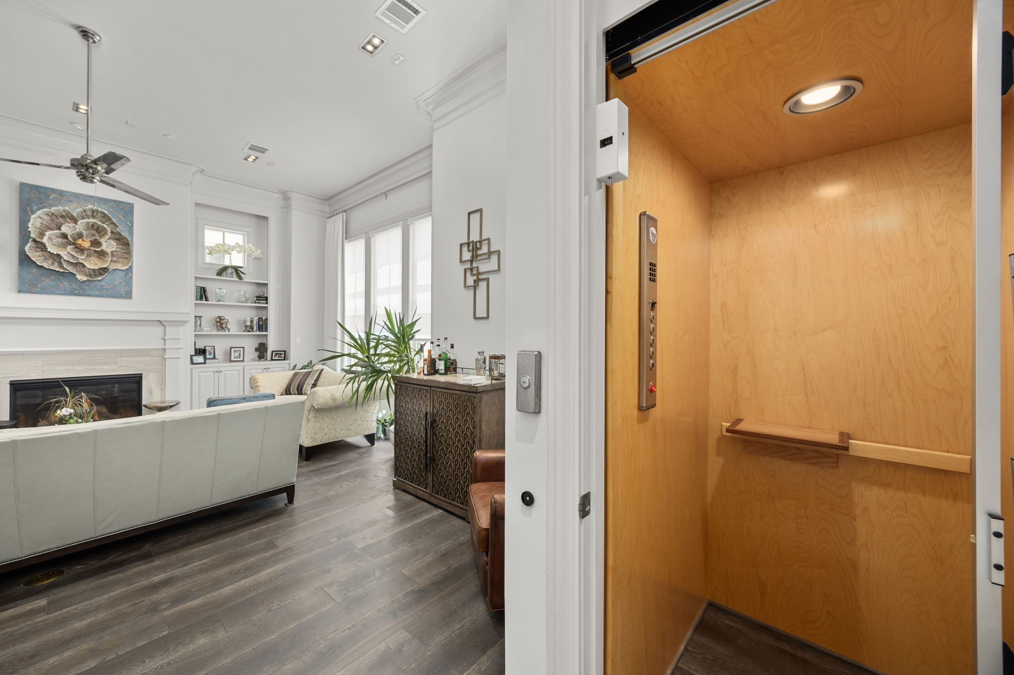 11 Robita Street Houston, TX 77019 - Photo 11 of 32 a living room with furniture and a fireplace