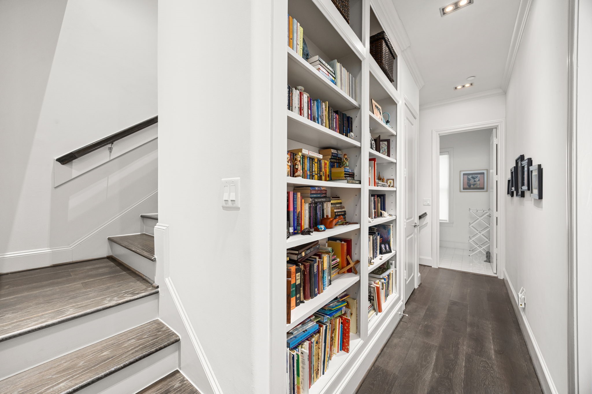 11 Robita Street Houston, TX 77019 - Photo 18 of 32 a view of a hallway with wooden floor and entryway