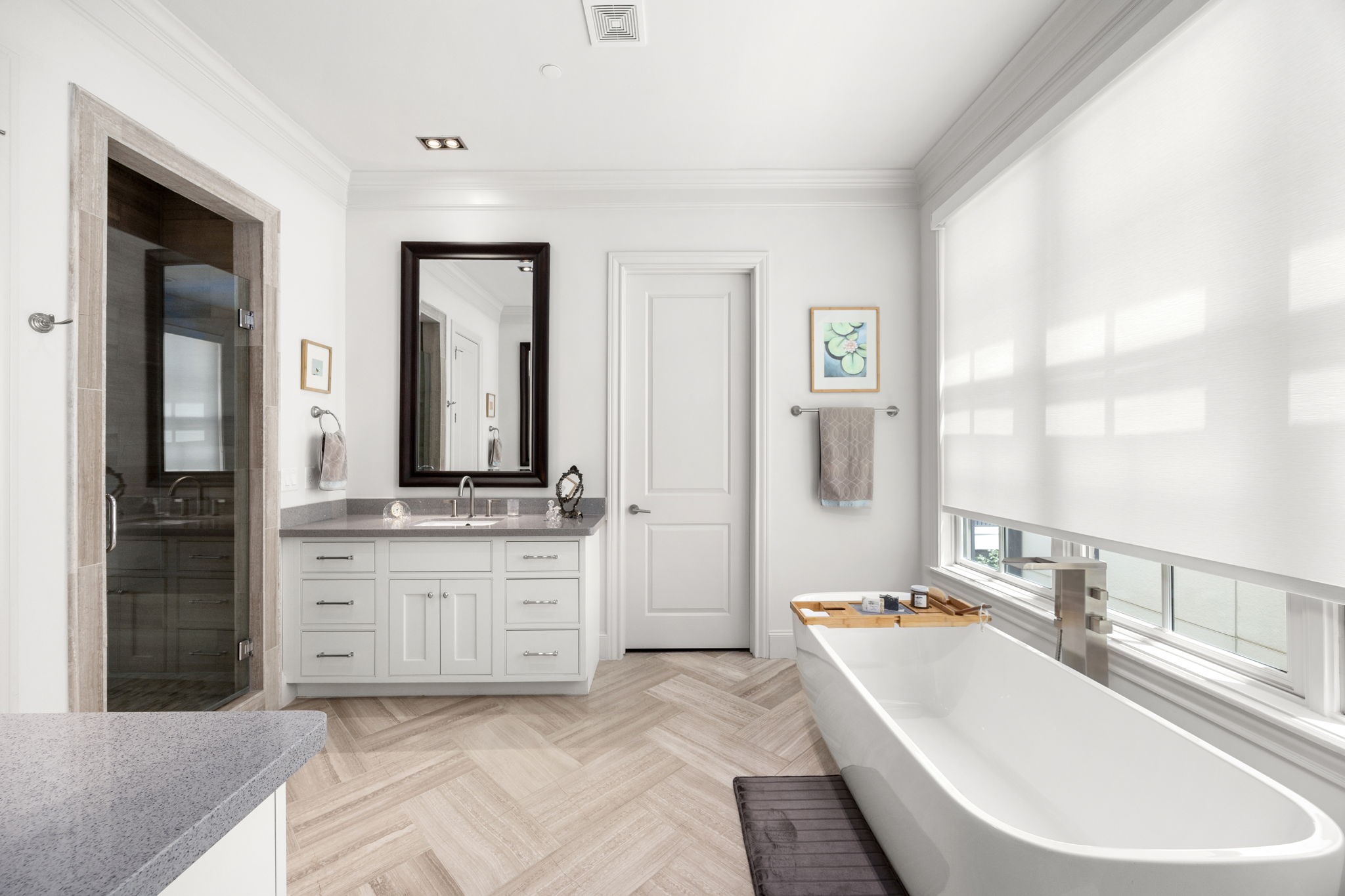 11 Robita Street Houston, TX 77019 - Photo 22 of 32 a bathroom with a granite countertop sink and a mirror