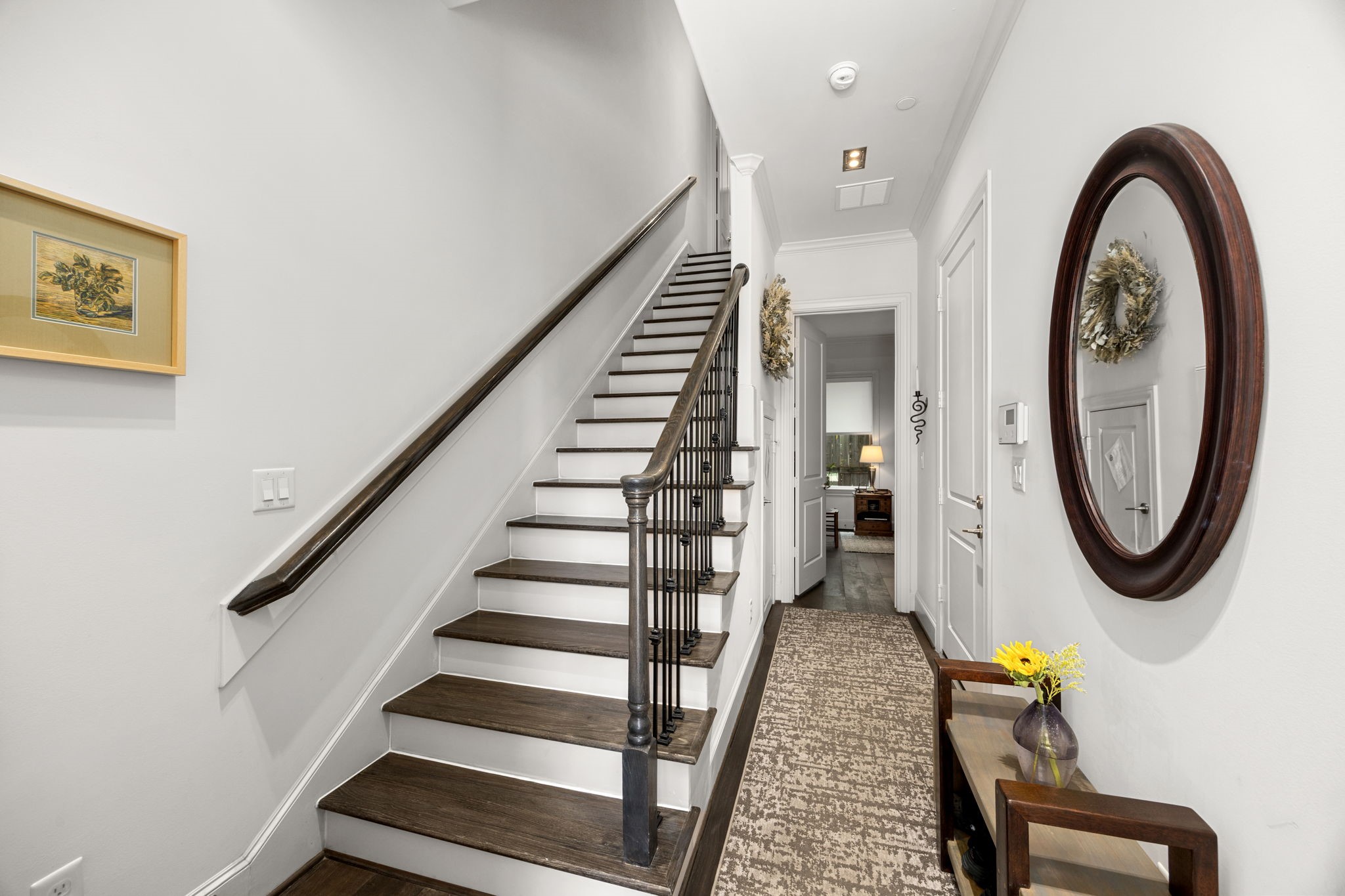 11 Robita Street Houston, TX 77019 - Photo 5 of 32 a view of entryway with wooden floor and window