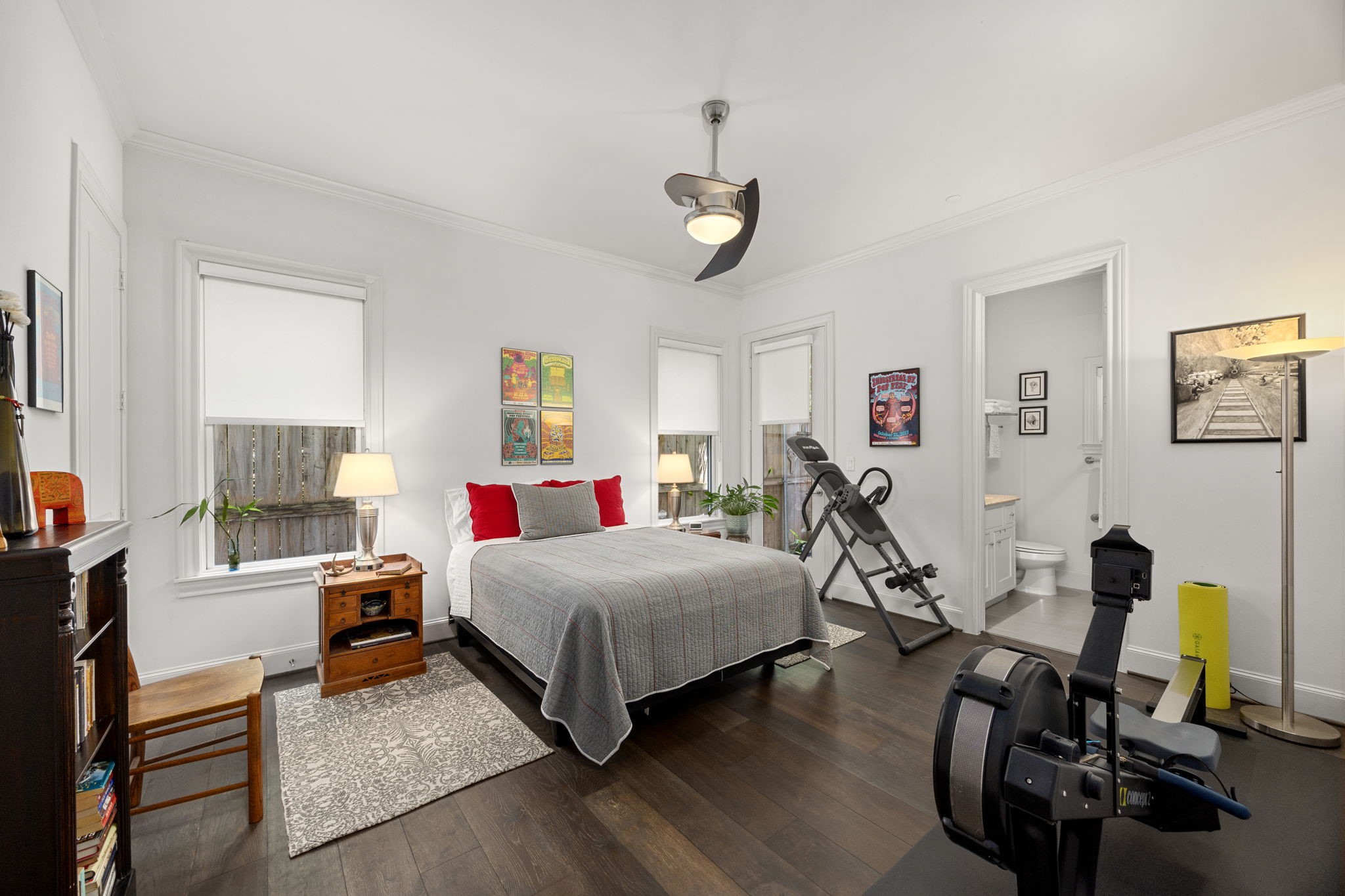 11 Robita Street Houston, TX 77019 - Photo 6 of 32 a room with a bed a couch and dresser