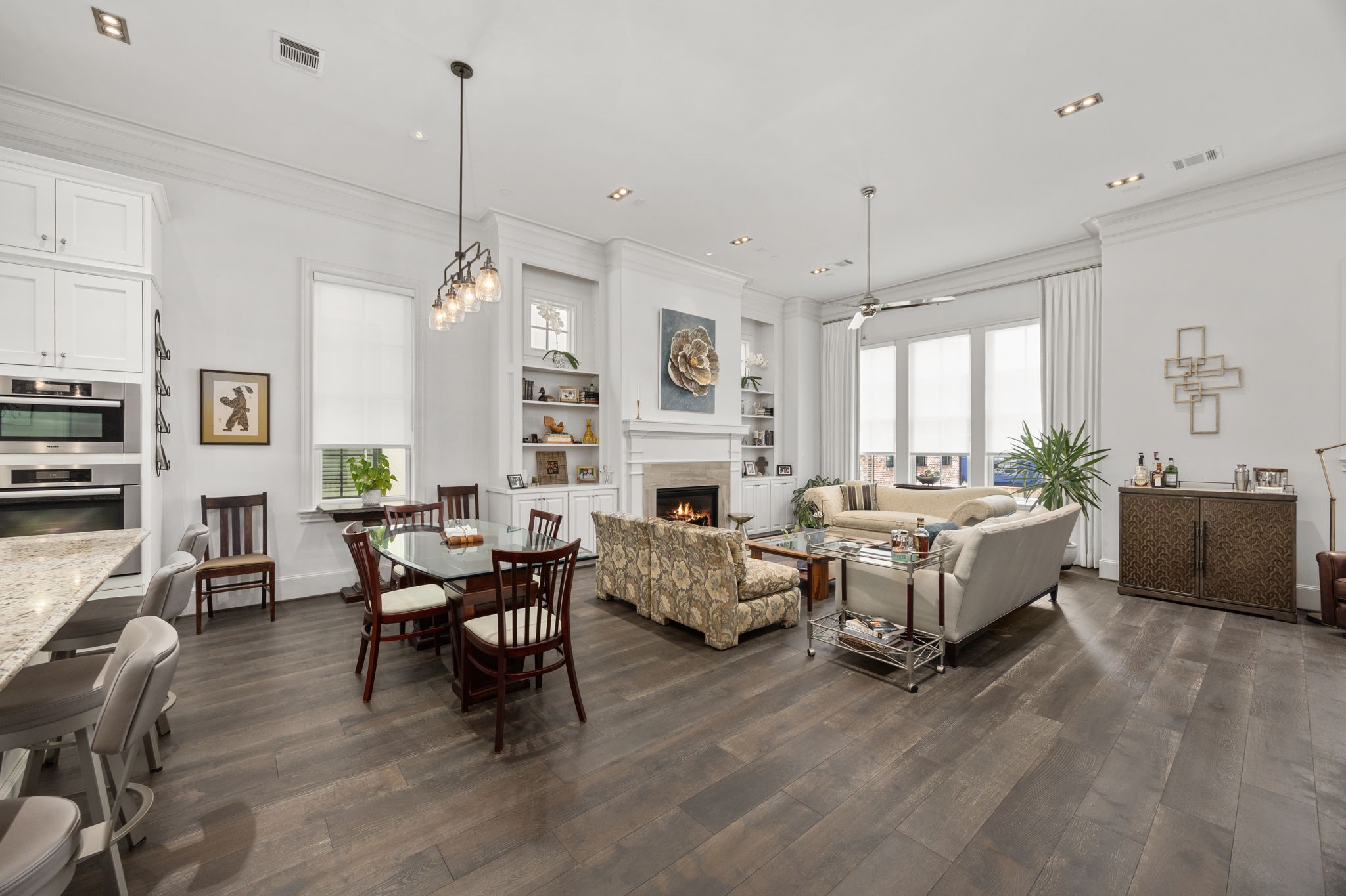 11 Robita Street Houston, TX 77019 - Photo 9 of 32 a living room with fireplace furniture and a chandelier