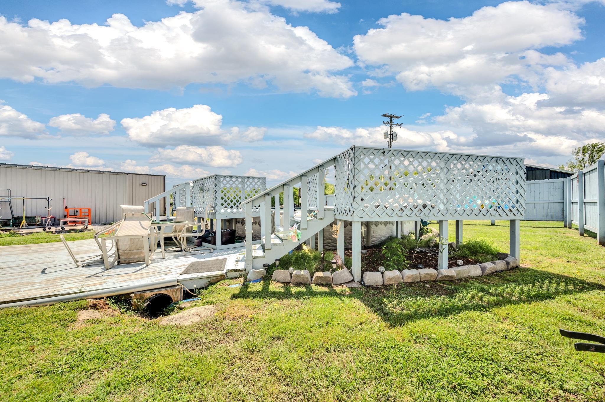 51 North Vanntown School Road Flintville, TN 37335 - Photo 2 of 46 a view of a swimming pool with a yard and furniture