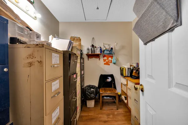 a view of living room with furniture and a window