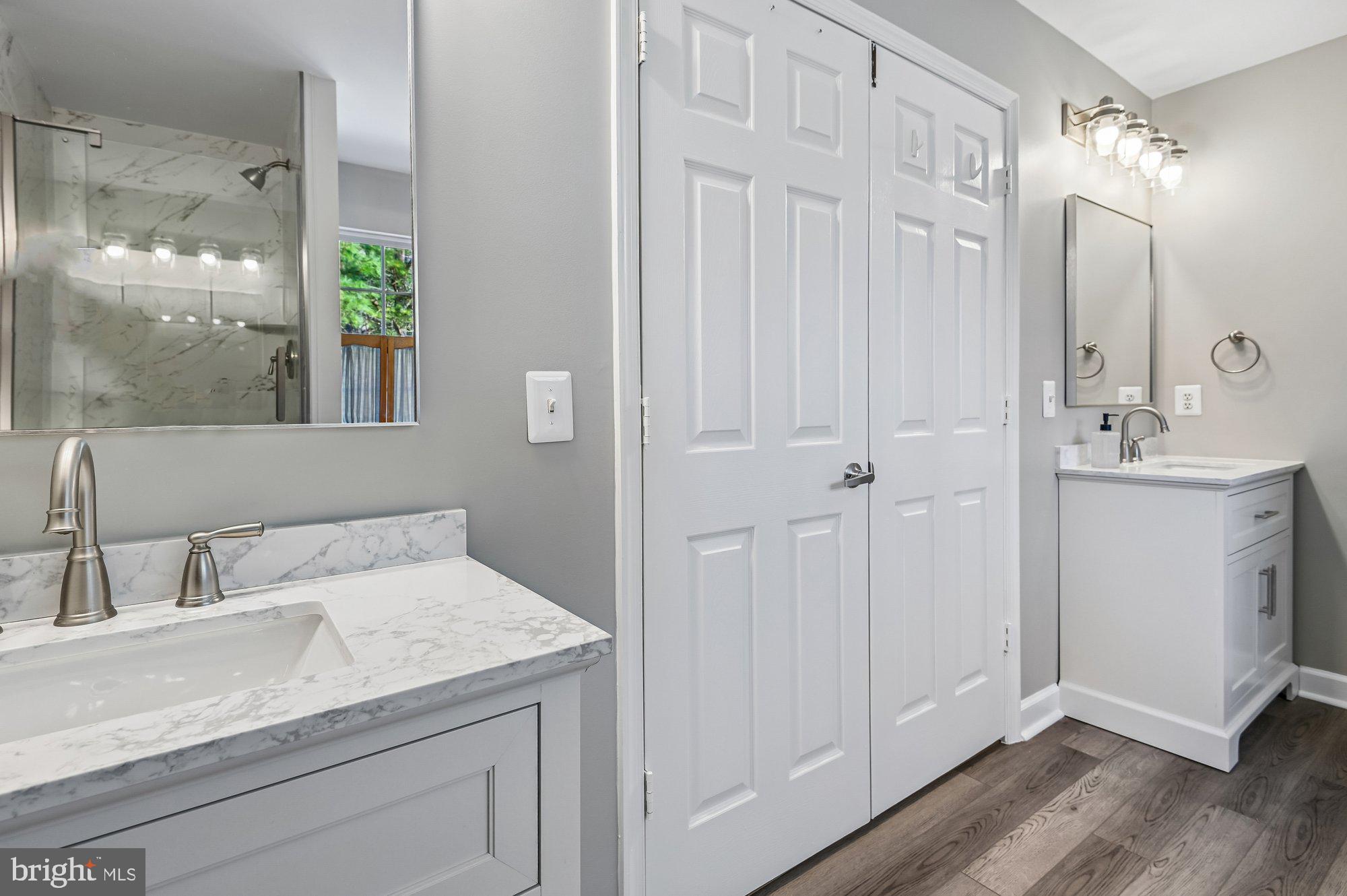 3225 Homewood Road Davidsonville, MD 21035 - Photo 17 of 33 a bathroom with a sink and mirror