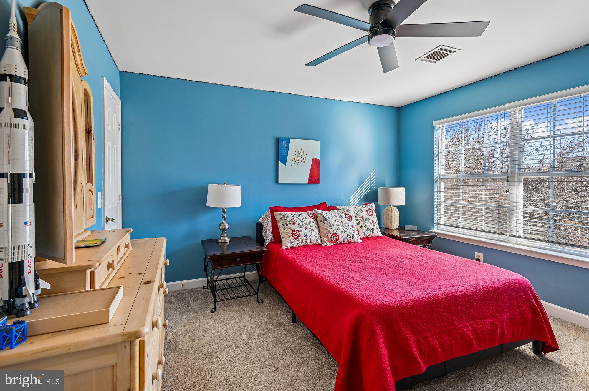 3225 Homewood Road Davidsonville, MD 21035 - Photo 18 of 33 a bedroom with a bed and a window