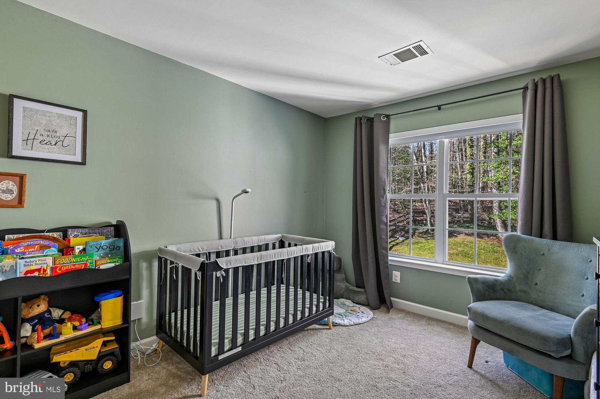 3225 Homewood Road Davidsonville, MD 21035 - Photo 19 of 33 a bedroom with a bed and a window
