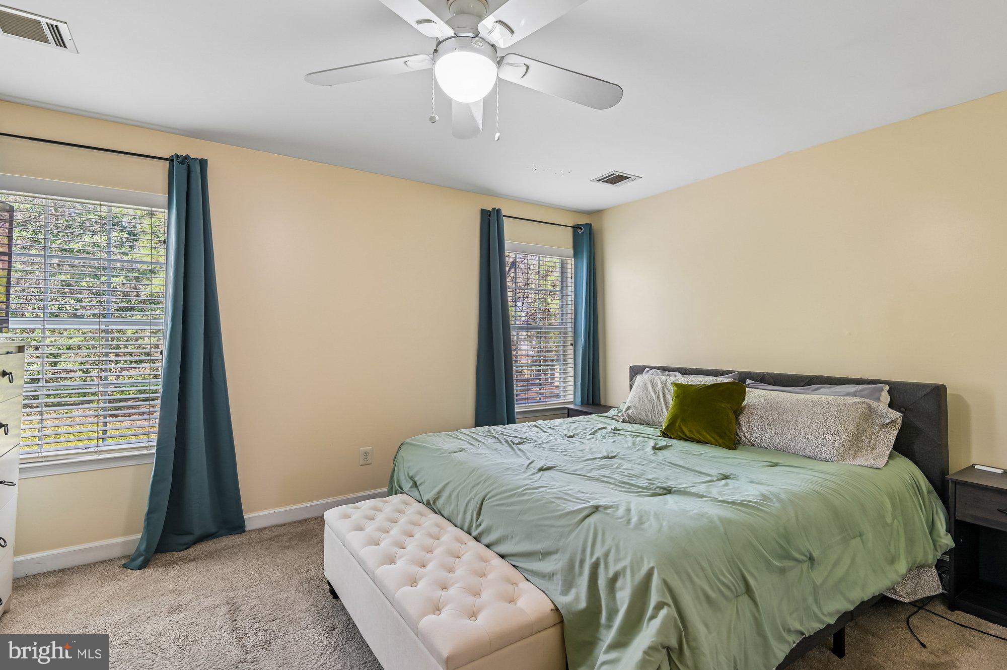 3225 Homewood Road Davidsonville, MD 21035 - Photo 20 of 33 a bedroom with a bed and window