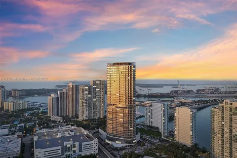 a view of a city with tall buildings