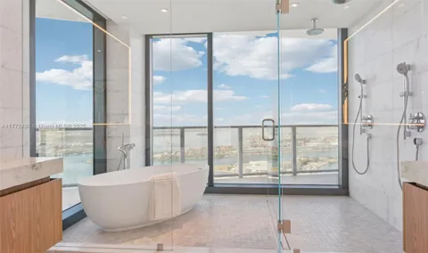 a bathroom with a sink a toilet and a bathtub