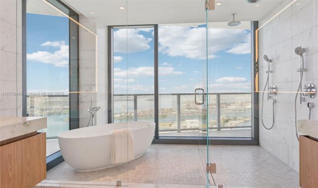 a bathroom with a sink a toilet and a bathtub
