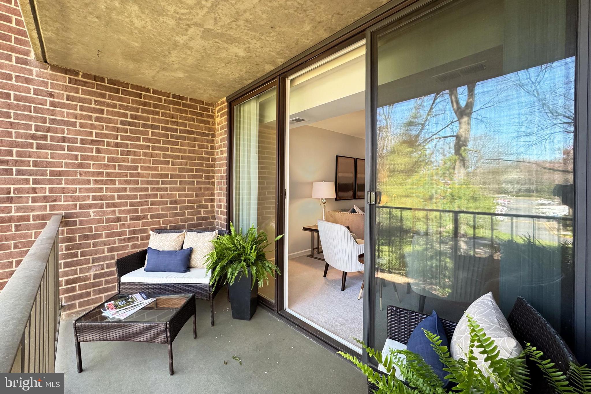 1439 Northgate Square, Unit 12A Reston, VA 20190 - Photo 10 of 40 Large Sliding Glass Door Offers Full Park Views