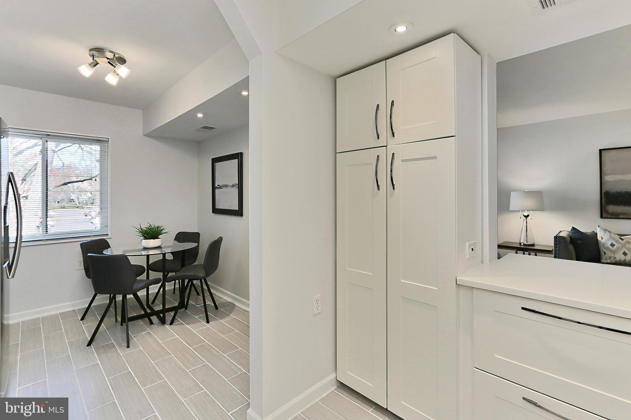1439 Northgate Square, Unit 12A Reston, VA 20190 - Photo 18 of 40 Enjoy the Pantry Cabinet and Tons of Rec Ltg