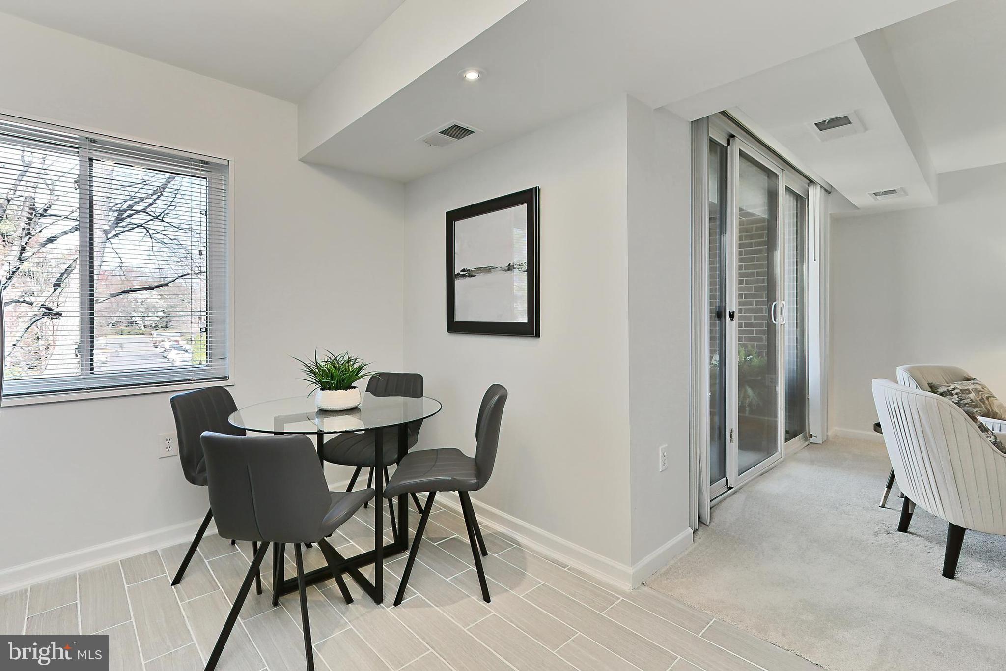 1439 Northgate Square, Unit 12A Reston, VA 20190 - Photo 20 of 40 Very Spacious Dining Area w/ Neutral Tile