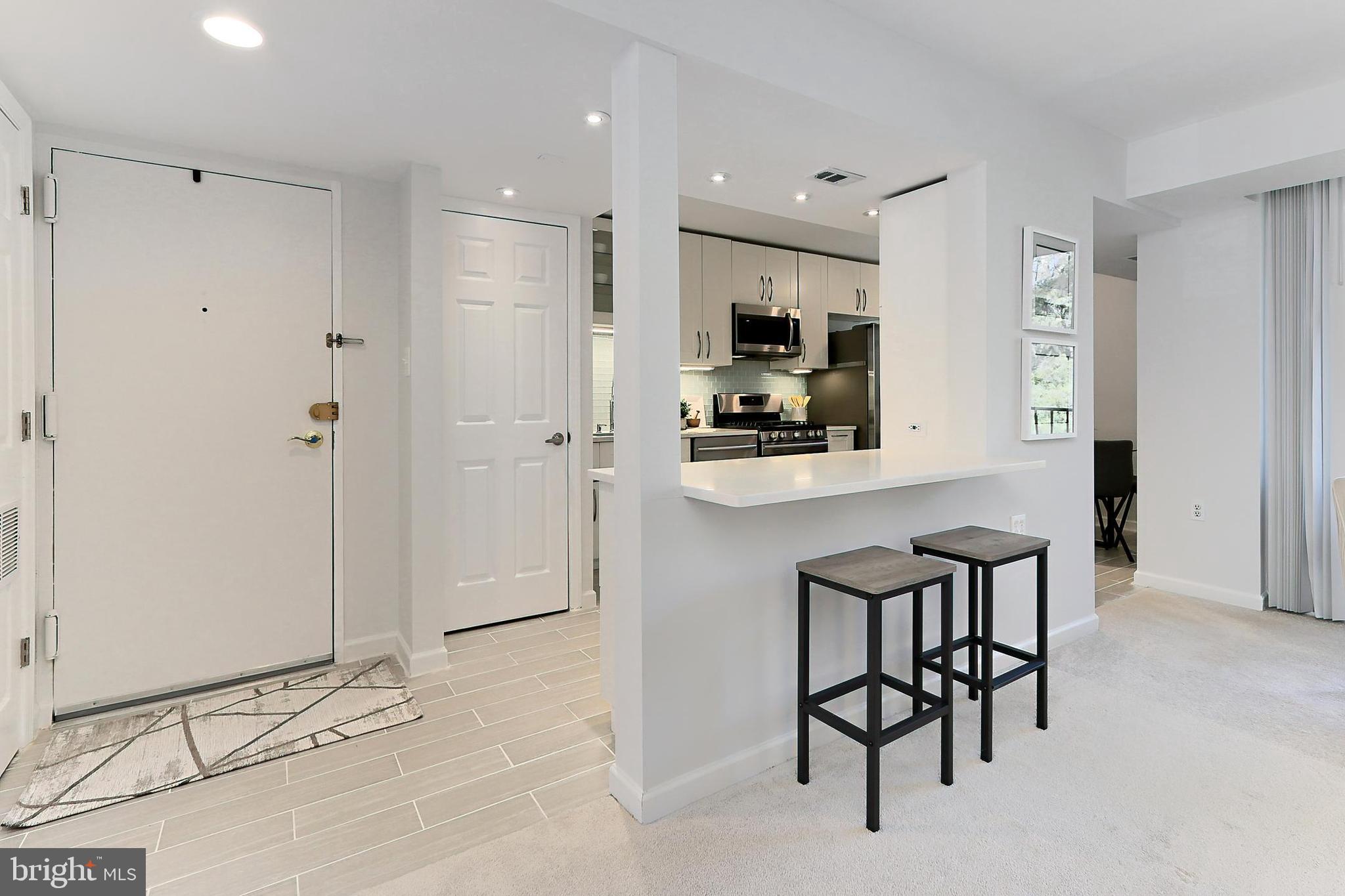 1439 Northgate Square, Unit 12A Reston, VA 20190 - Photo 4 of 40 Light and Bright and Filled to the Brim W Updates