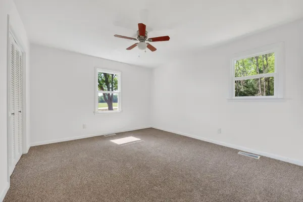 a house view with a garden space