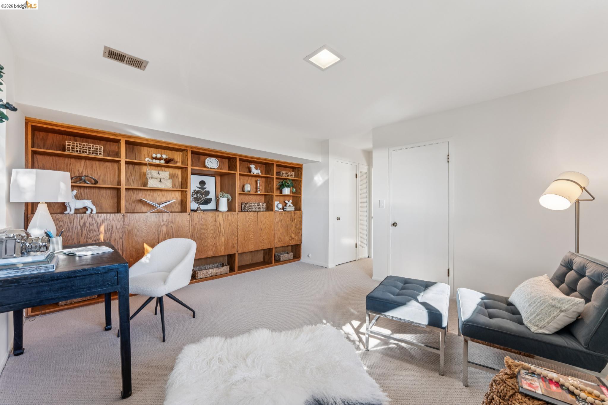 1155 Keeler Avenue Berkeley, CA 94708 - Photo 11 of 45 a living room with furniture and a window
