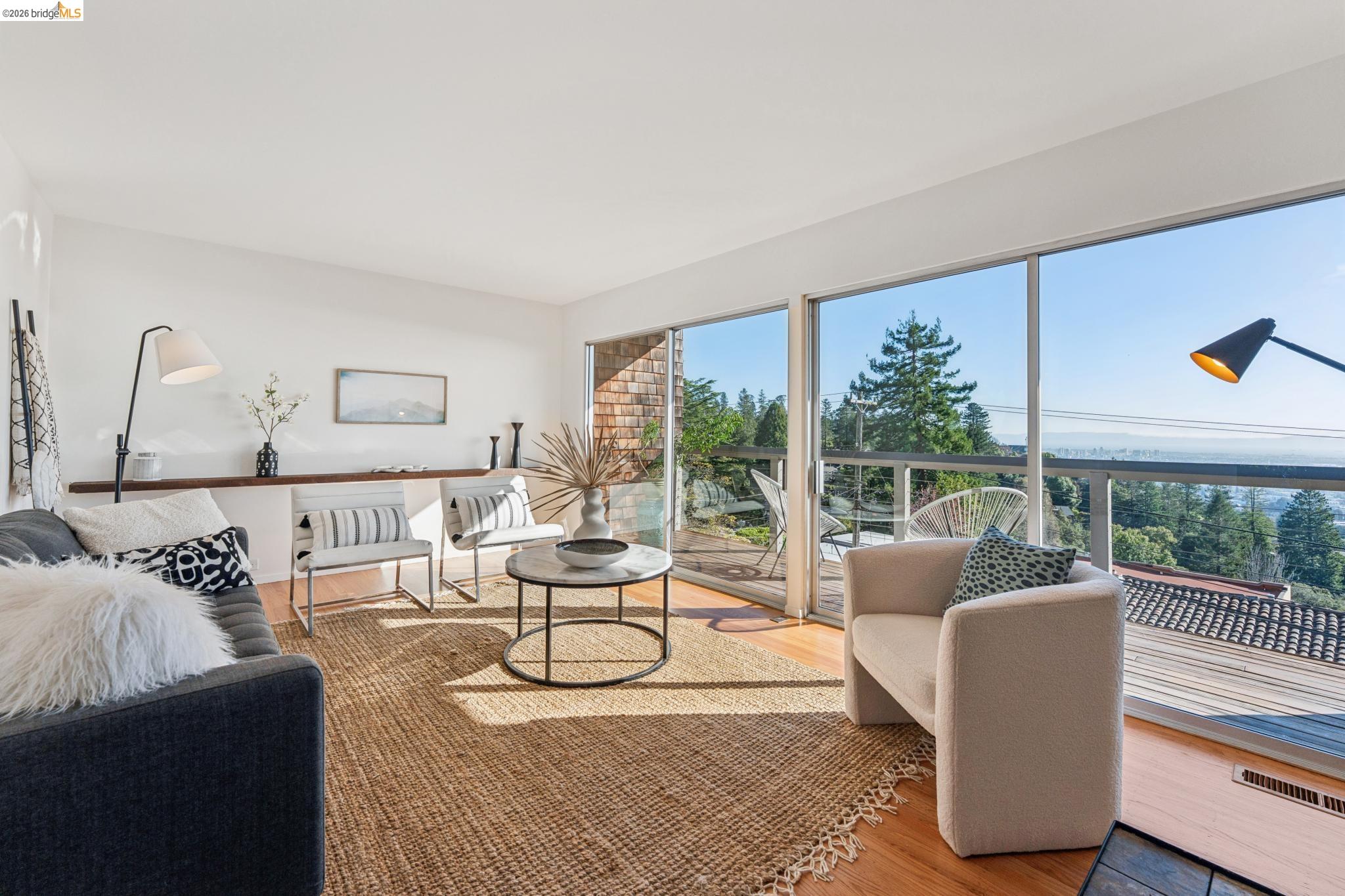 1155 Keeler Avenue Berkeley, CA 94708 - Photo 16 of 45 a living room with furniture and a large window
