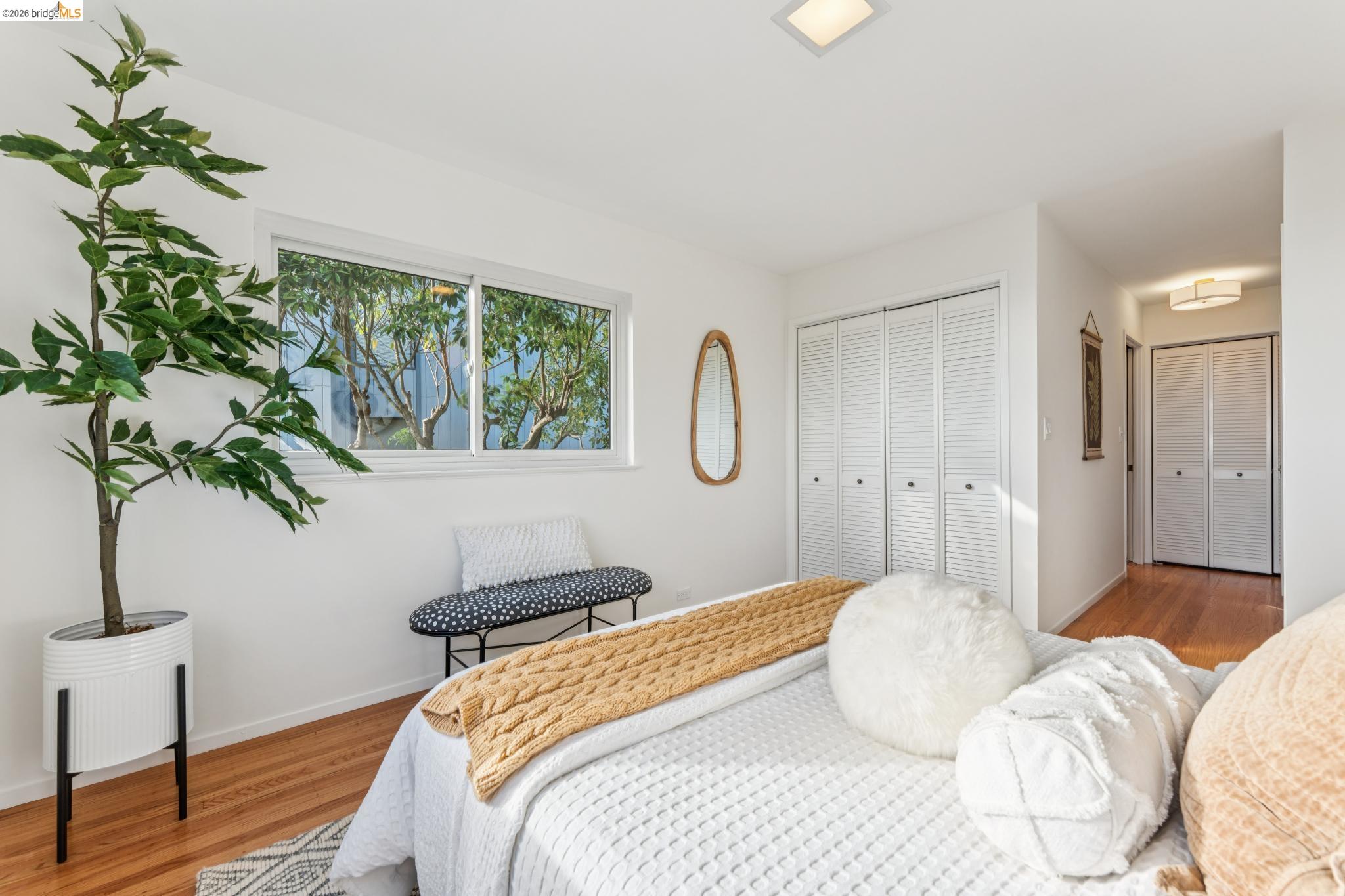 1155 Keeler Avenue Berkeley, CA 94708 - Photo 21 of 45 a bedroom with bed and a window