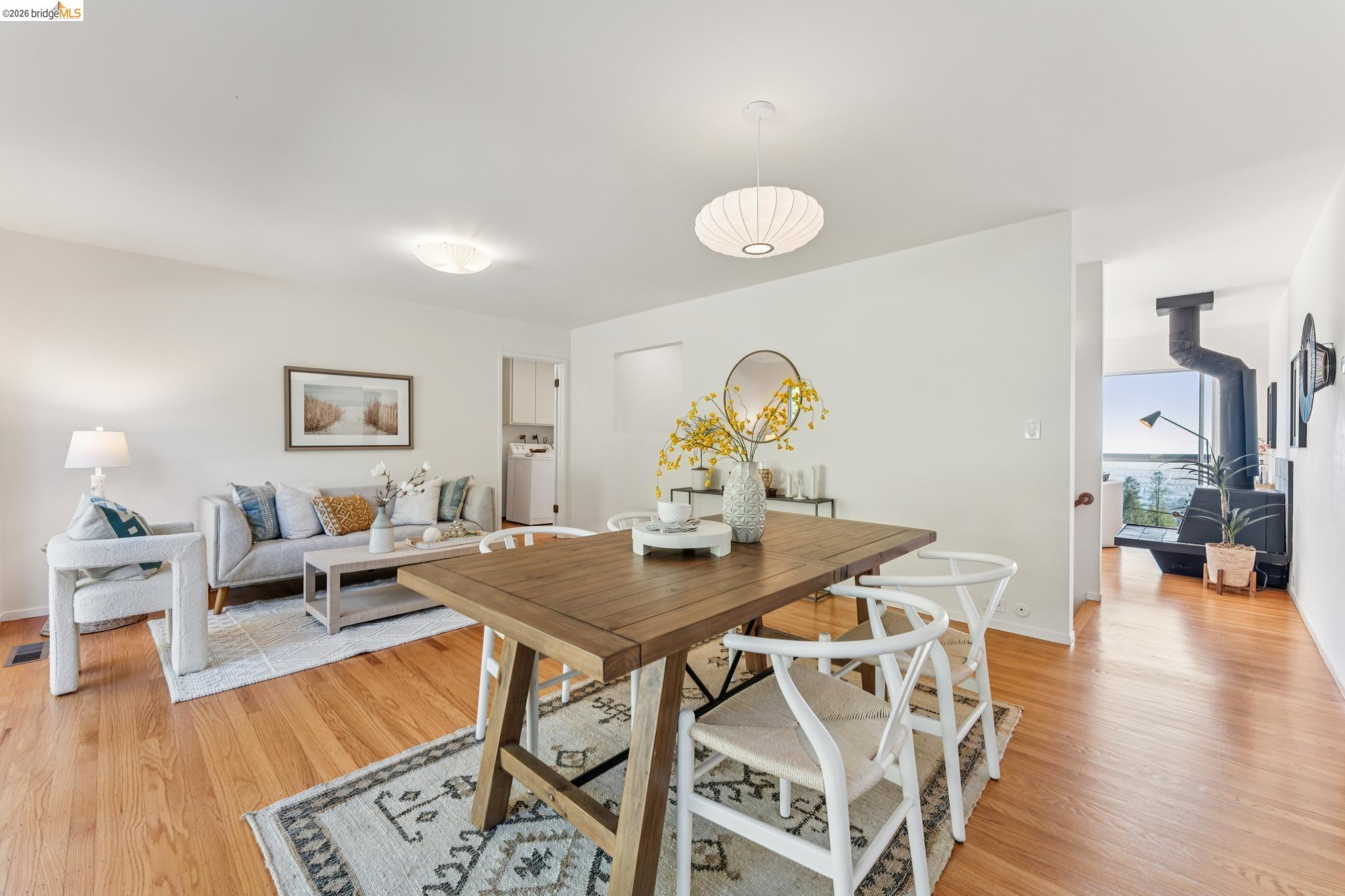 1155 Keeler Avenue Berkeley, CA 94708 - Photo 28 of 45 a view of a dining room with furniture and wooden floor