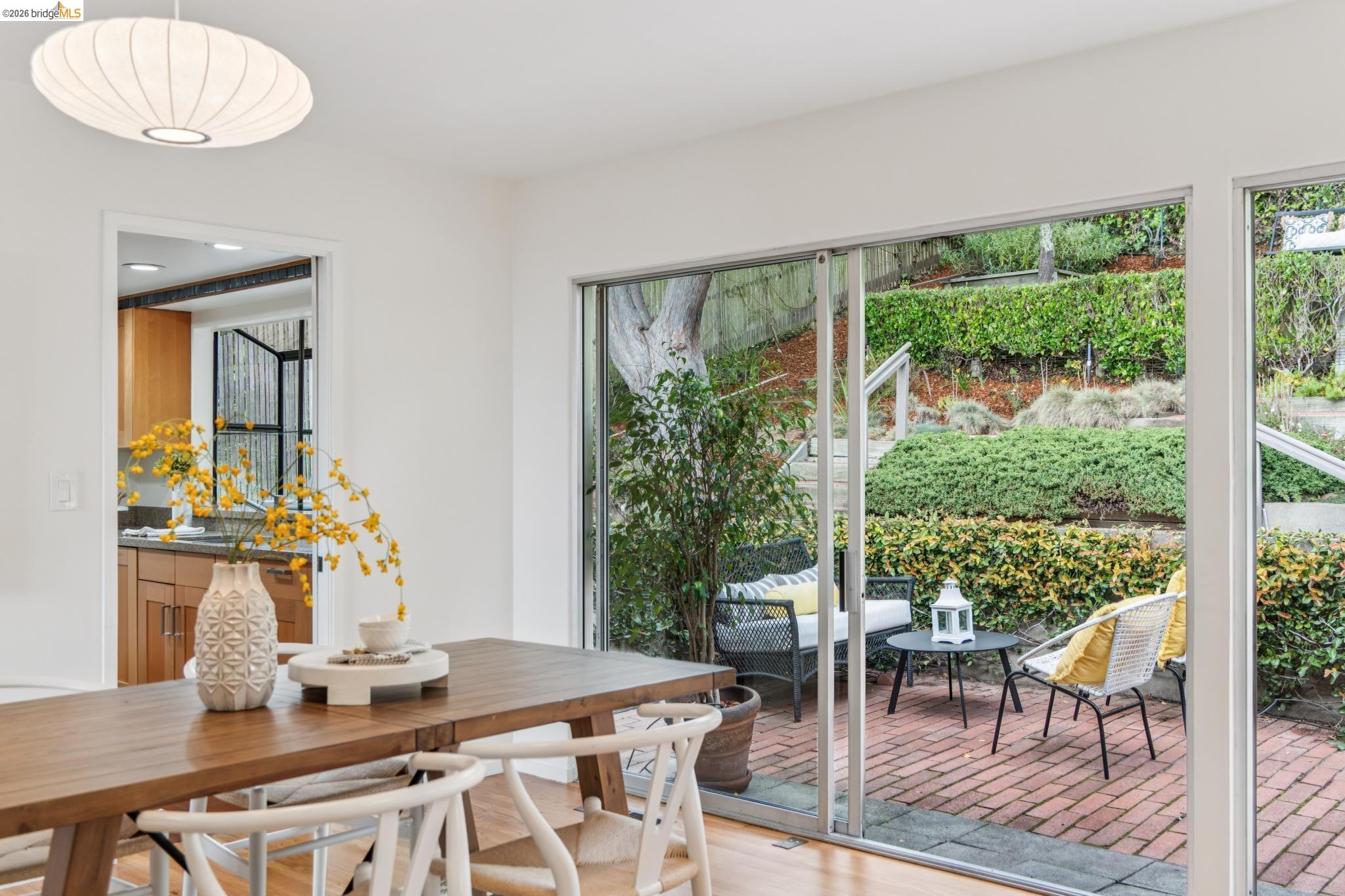1155 Keeler Avenue Berkeley, CA 94708 - Photo 29 of 45 a view of a dining room with furniture window and outside view