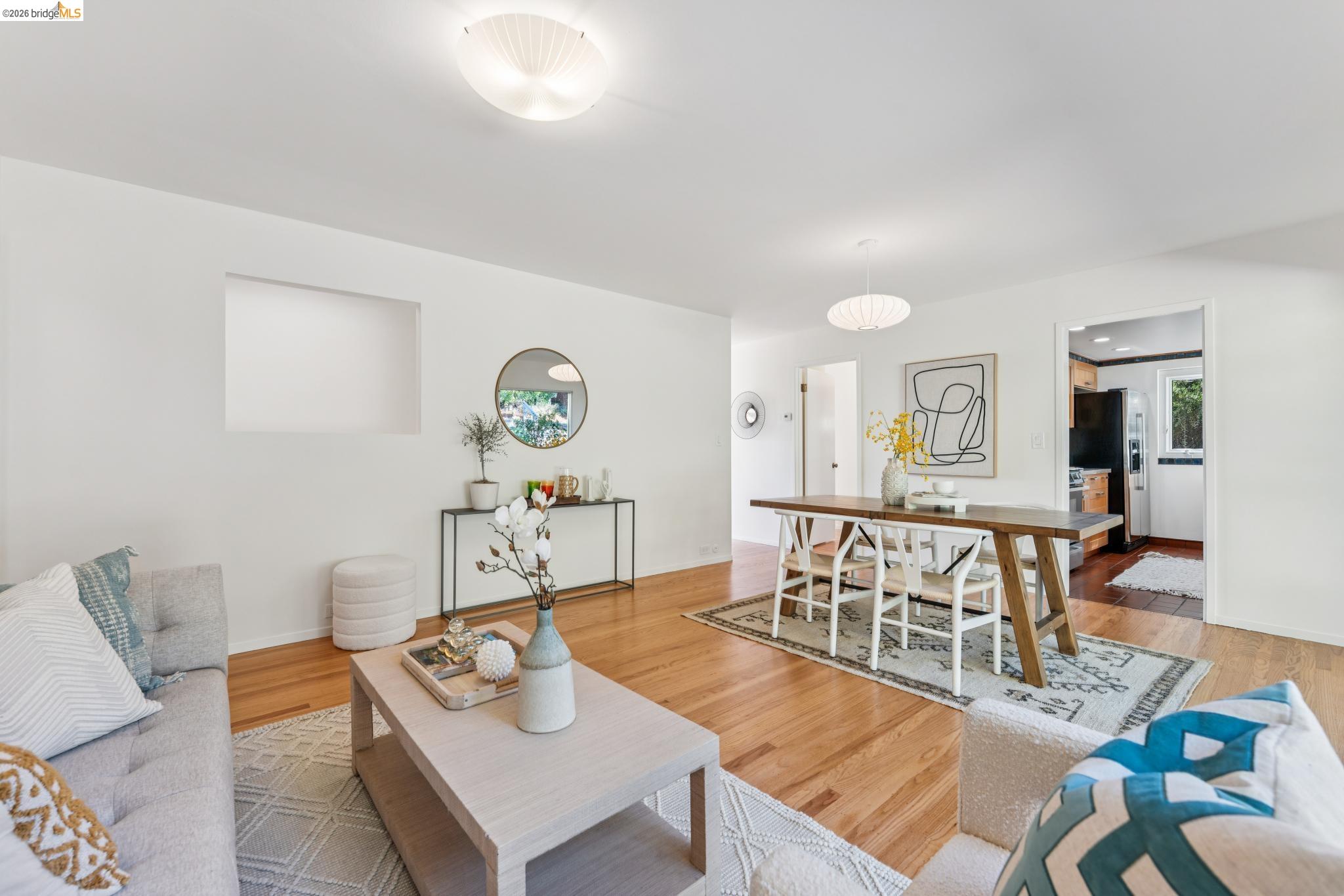 1155 Keeler Avenue Berkeley, CA 94708 - Photo 30 of 45 a living room with furniture and wooden floor
