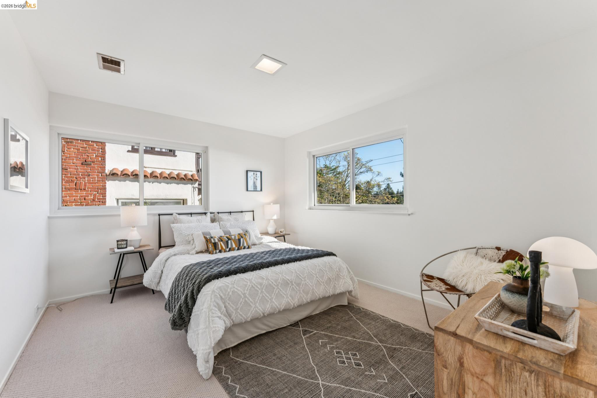 1155 Keeler Avenue Berkeley, CA 94708 - Photo 7 of 45 a bedroom with a bed and a painting on the wall