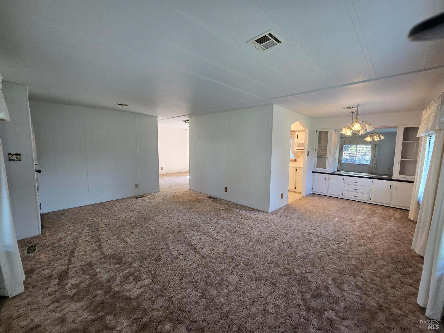233 Apple Lane Rohnert Park, CA 94928 - Photo 14 of 17 an empty room with windows and entrance