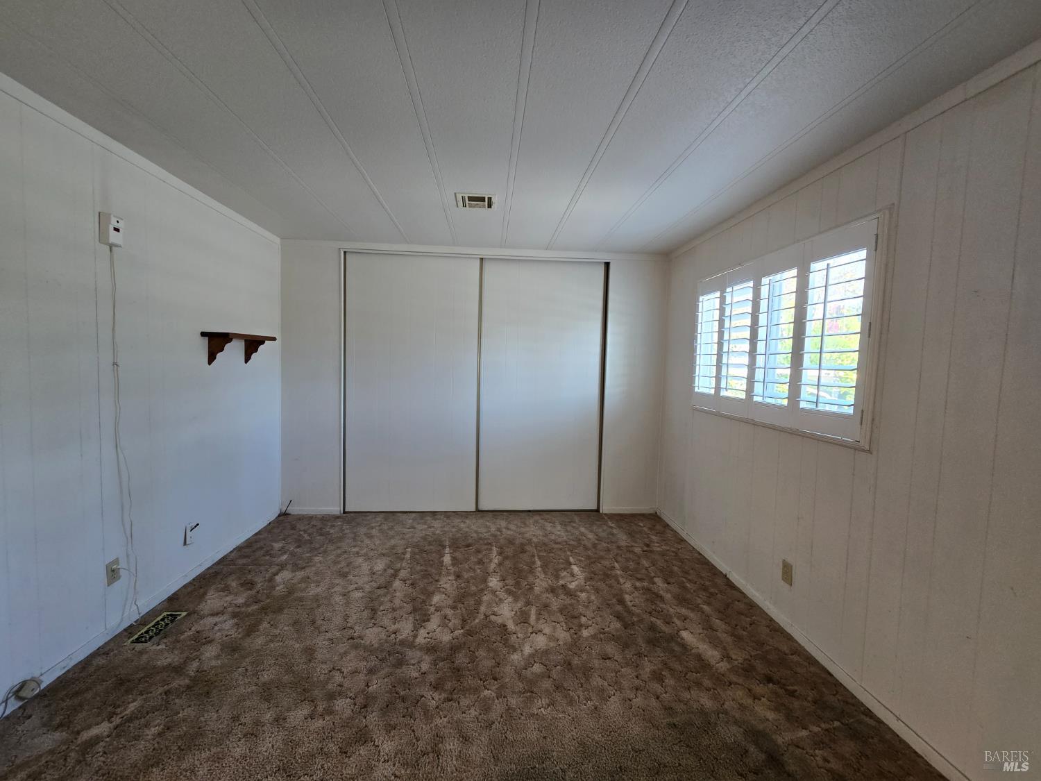 233 Apple Lane Rohnert Park, CA 94928 - Photo 7 of 19 a view of an empty room with a window