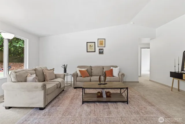 a living room with furniture and a couch