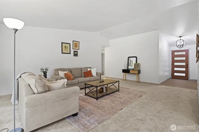 a living room with furniture and a couch