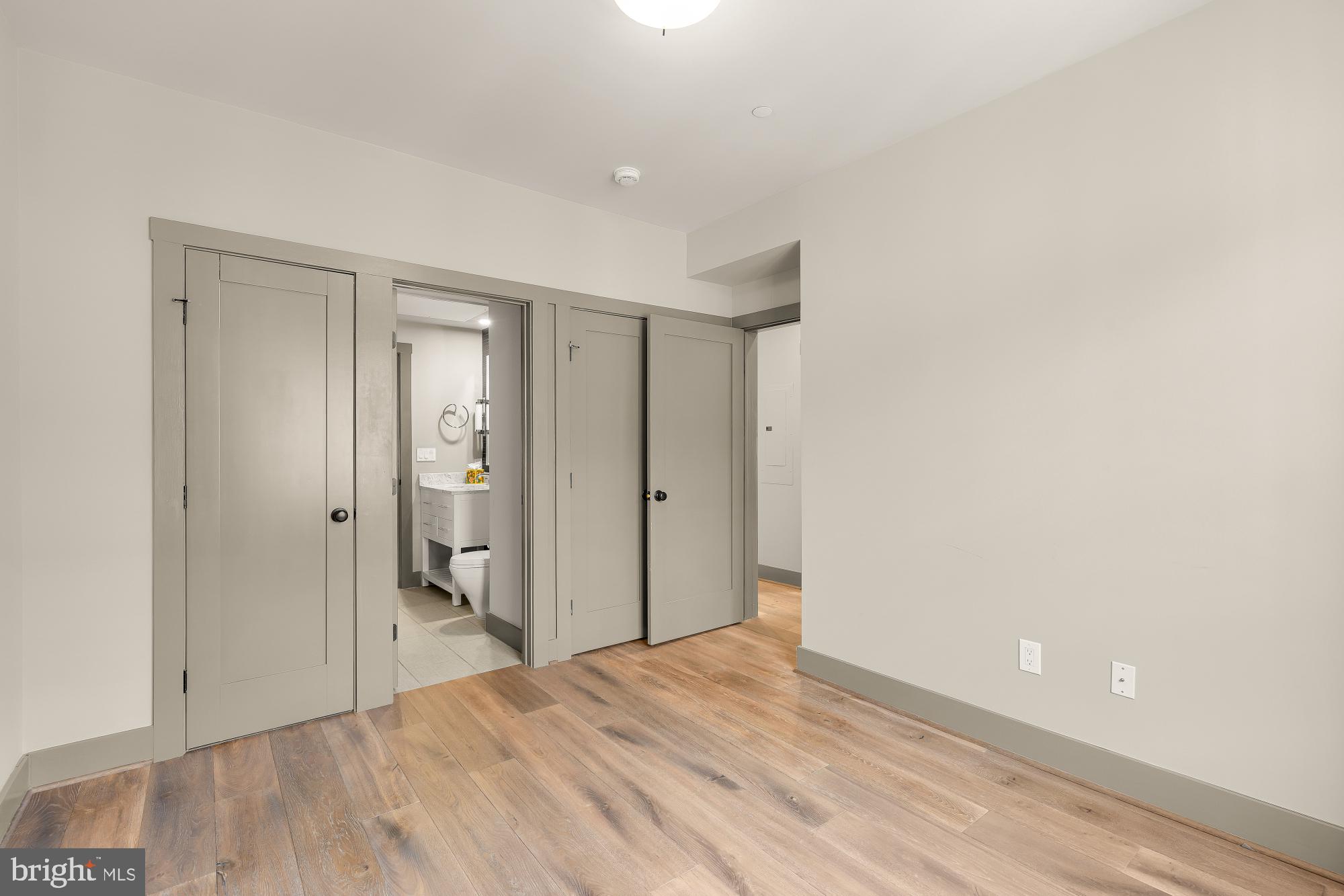 3220 Grace Street Northwest, Unit 5 Washington, DC 20007 - Photo 20 of 31 a view of hallway with wooden floor