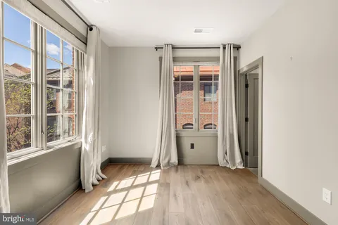 an empty room with windows