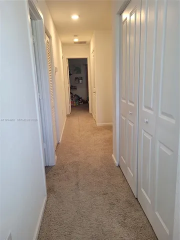 a view of entryway with livingroom