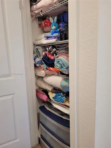 a view of storage and utility room