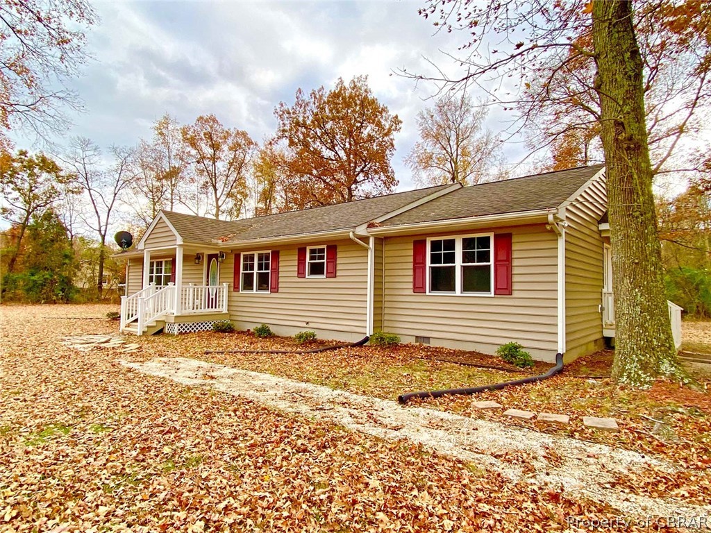 293 Norwood Church Road Lancaster, VA 22503 - Photo 1 of 48 Front of the Home with Gravel Walkway
