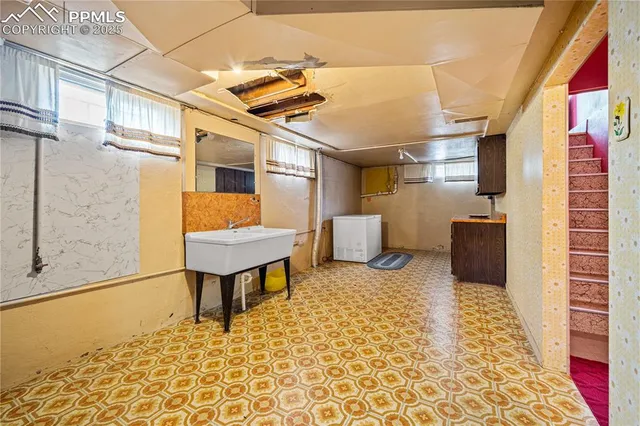 a living room with a couch and a table