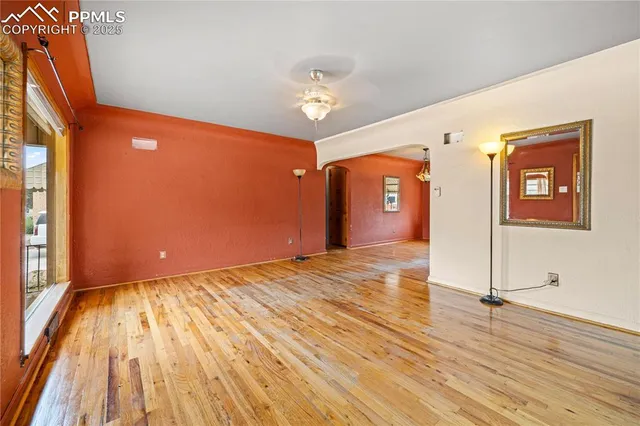 a view of a livingroom with wooden floor