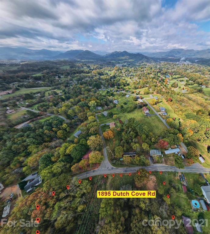 1895 Dutch Cove Road Canton, NC 28716 - Photo 12 of 13 a view of a city and mountains
