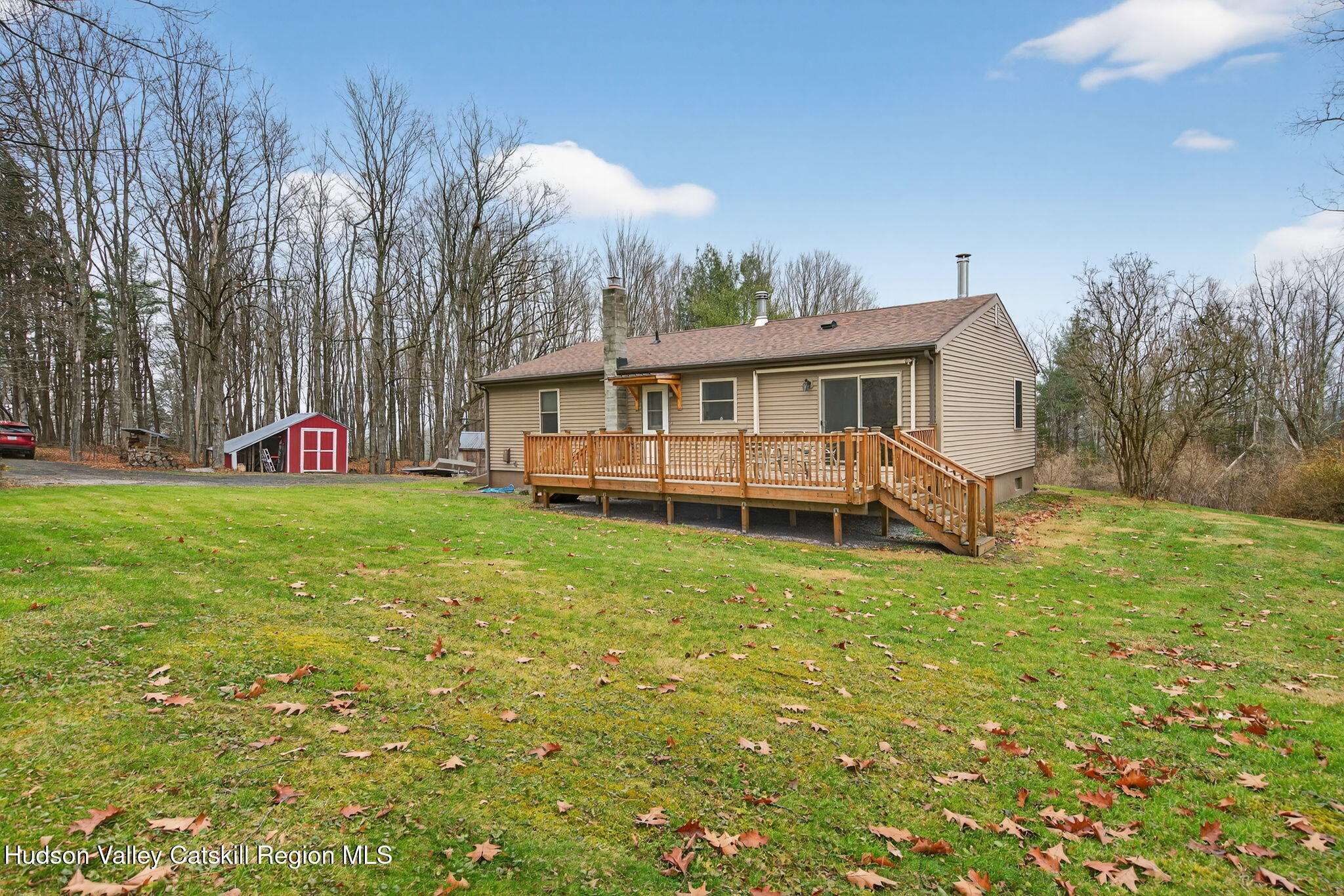 320 Shady Glen Road East Durham, NY 12423 - Photo 1 of 47 a view of a house with a yard porch and sitting area
