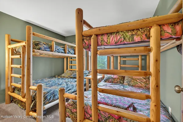 a view of an chairs and table in the balcony