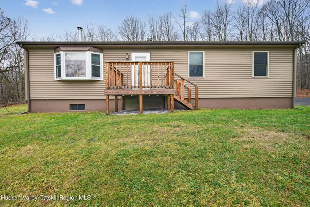 a view of a yard with trees
