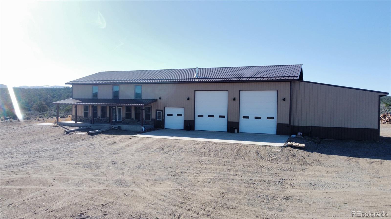 3744 Icehouse Road Fort Garland, CO 81133 - Photo 2 of 48 a view of front door of house