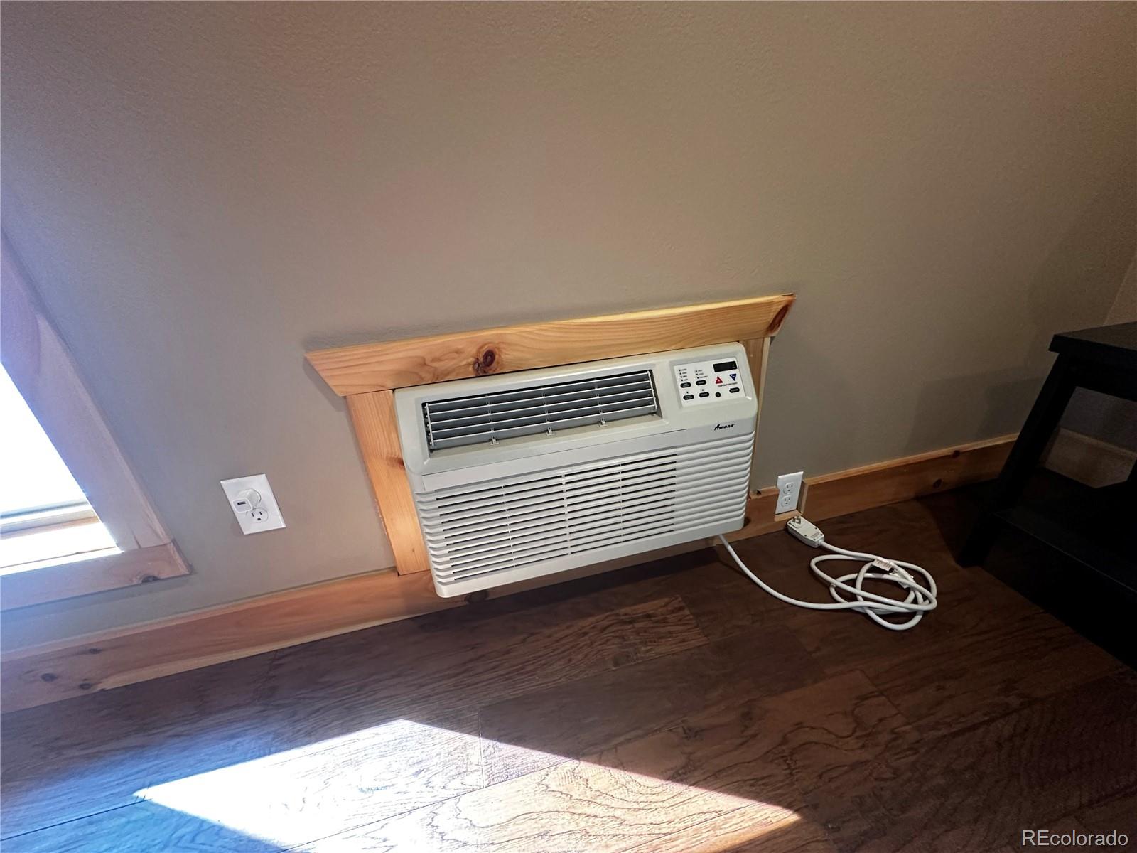 3744 Icehouse Road Fort Garland, CO 81133 - Photo 21 of 48 a view of empty room with wooden floor